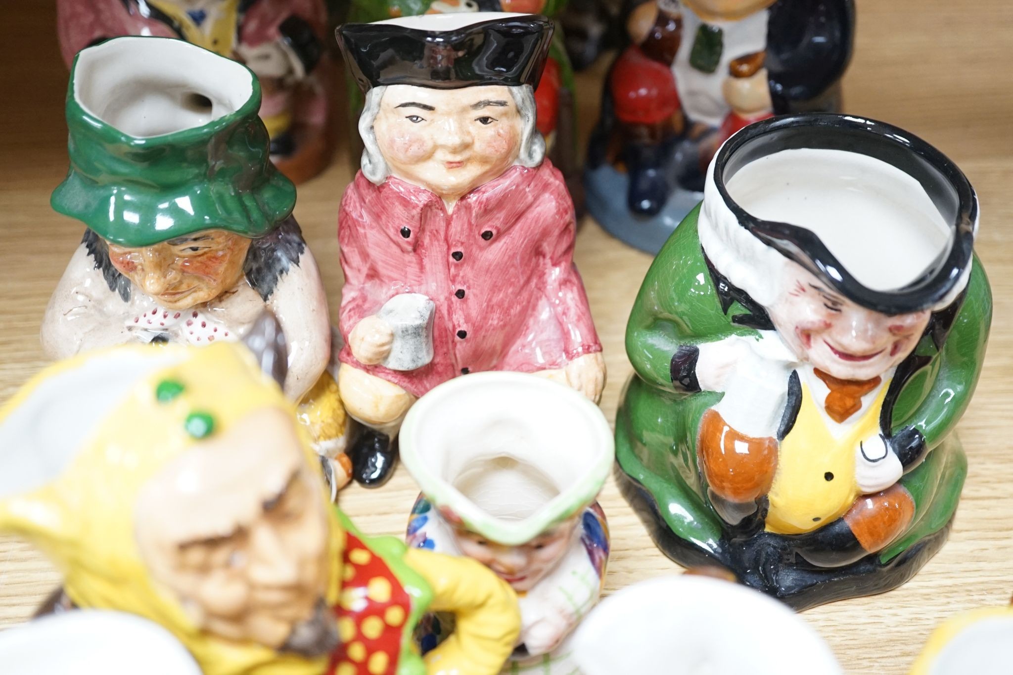 Nineteen various Toby pottery jugs, tallest 18 cm